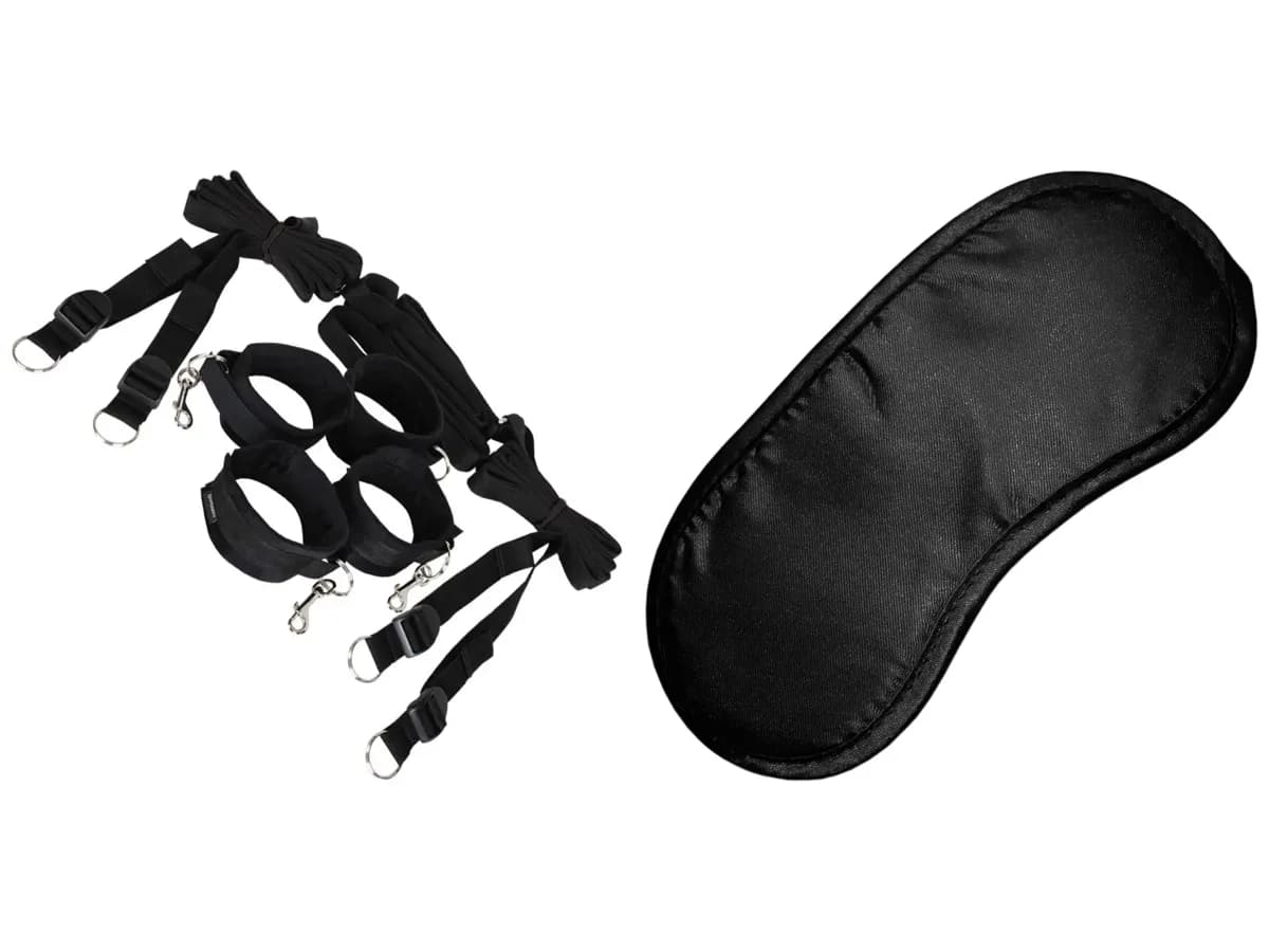 Sportsheets Under the Bed restraint kit and a black satin blindfold.