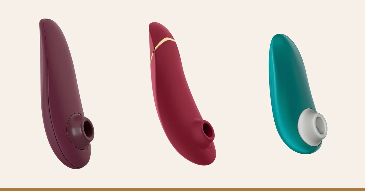 Womanizer Classic 2 next to a Womanizer Premium 2 and a Womanizer Starlet 3.