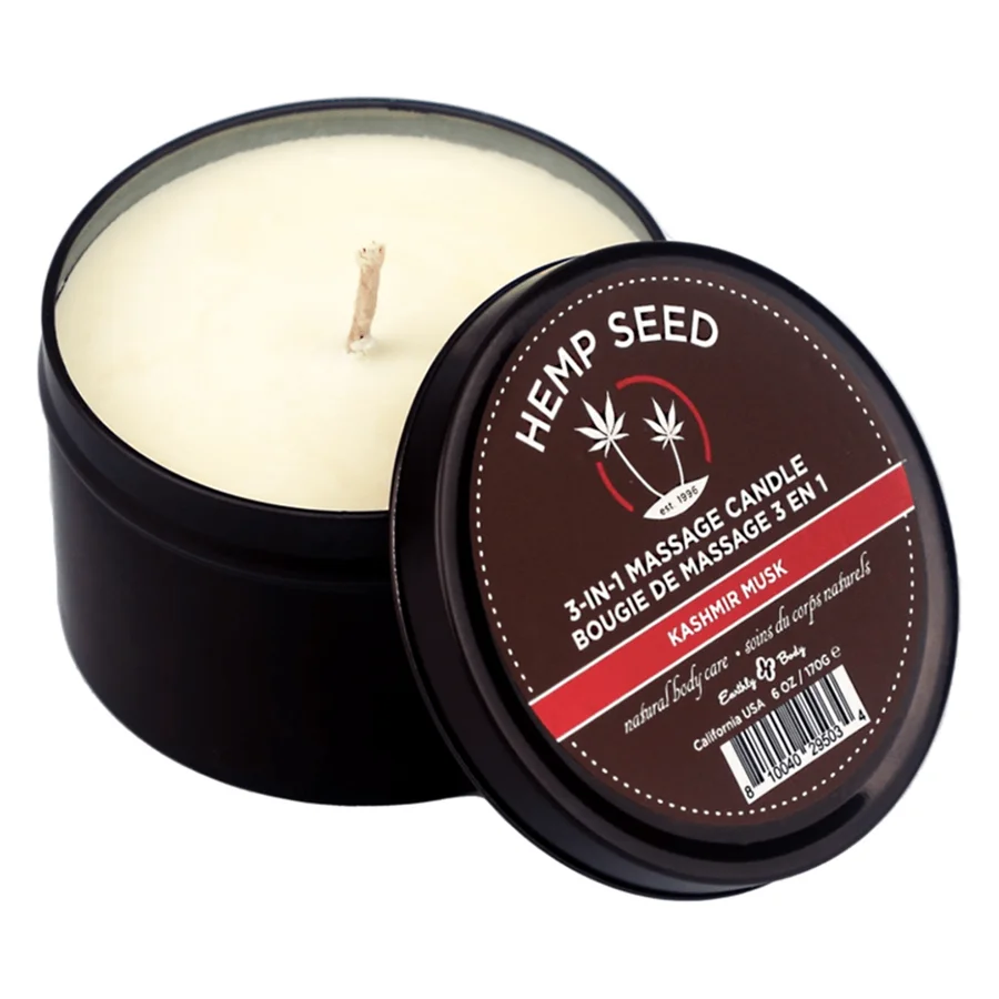 Earthly Body Hemp Seed 3-in-1 massage candle in Kashmir Musk, a black tin with cream wax.