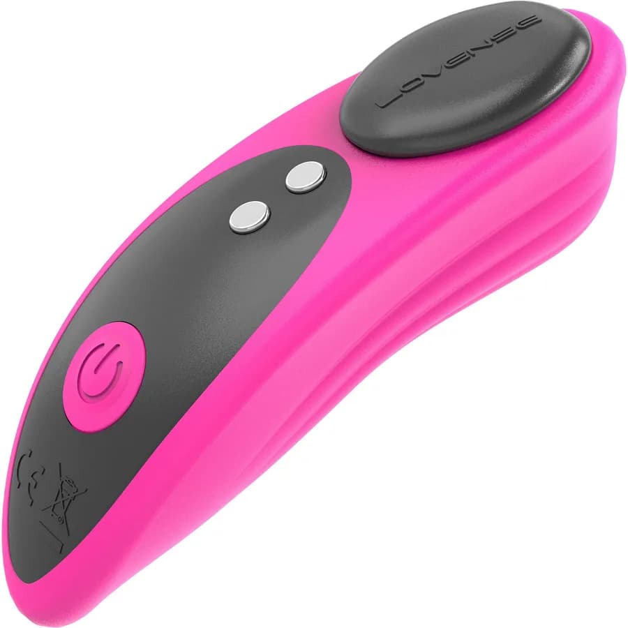 Lovense Ferri magnetic panty vibrator in pink silicone with its magnet cap.