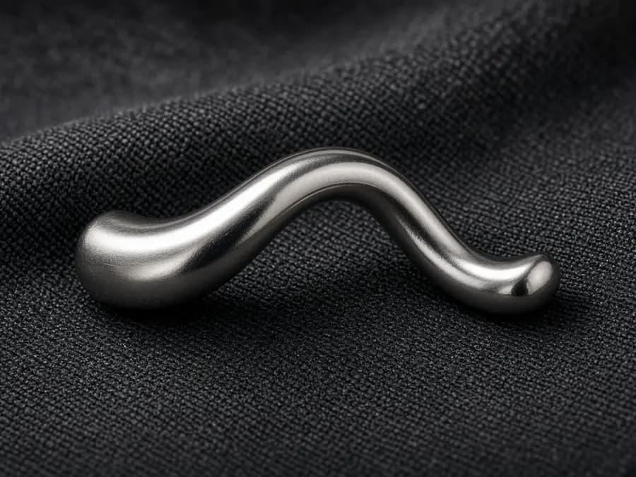 Polished stainless steel surface. Material example, not a specific SKU.