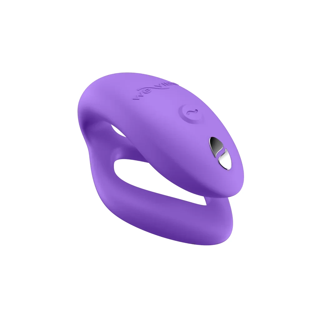 Official We-Vibe Sync O in purple. O-shaped couples vibrator on white.